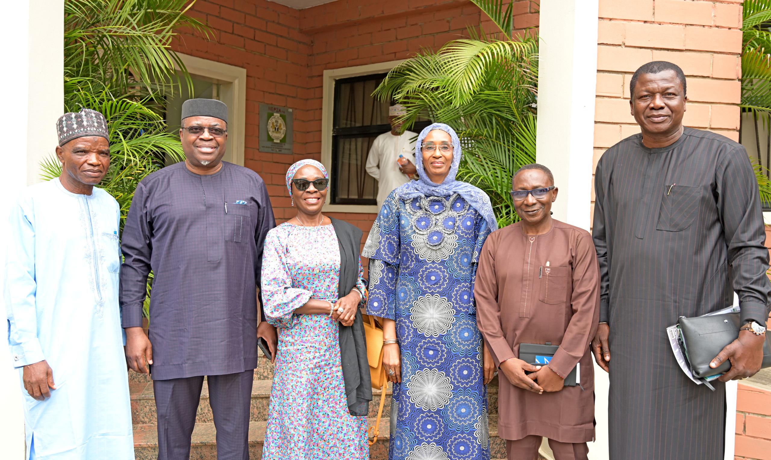 NEPZA officials, Dangote Refinery representatives, and committee members in strategic meeting to implement presidential directive on local fuel pricing.
