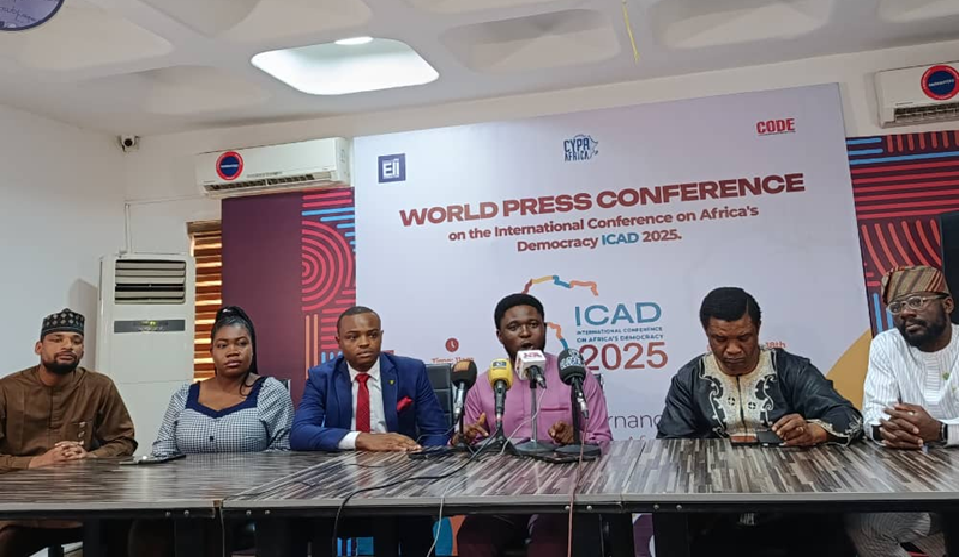 Chris Iyama at the ICAD 2025 pre-conference briefing, addressing African democracy and development