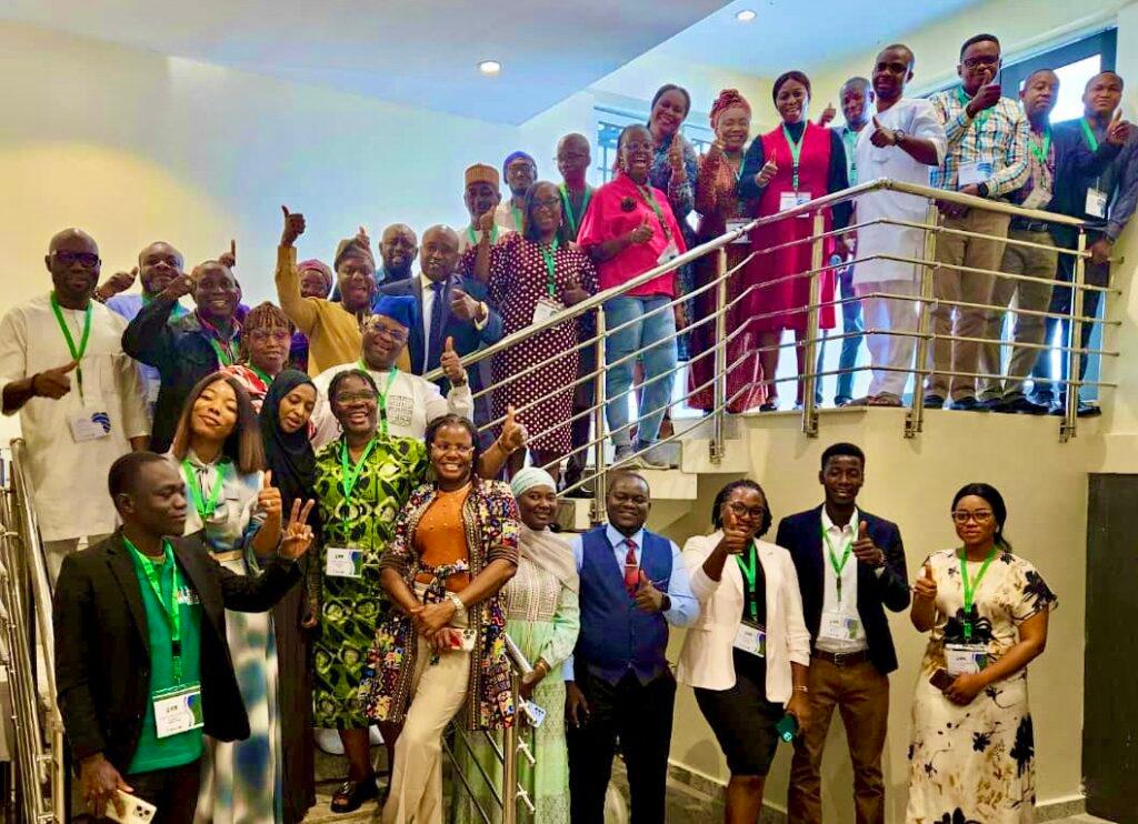 17 public health emergency personnel from West Africa pose with certificates after completing U.S.-CDC emergency management training in Abuja.