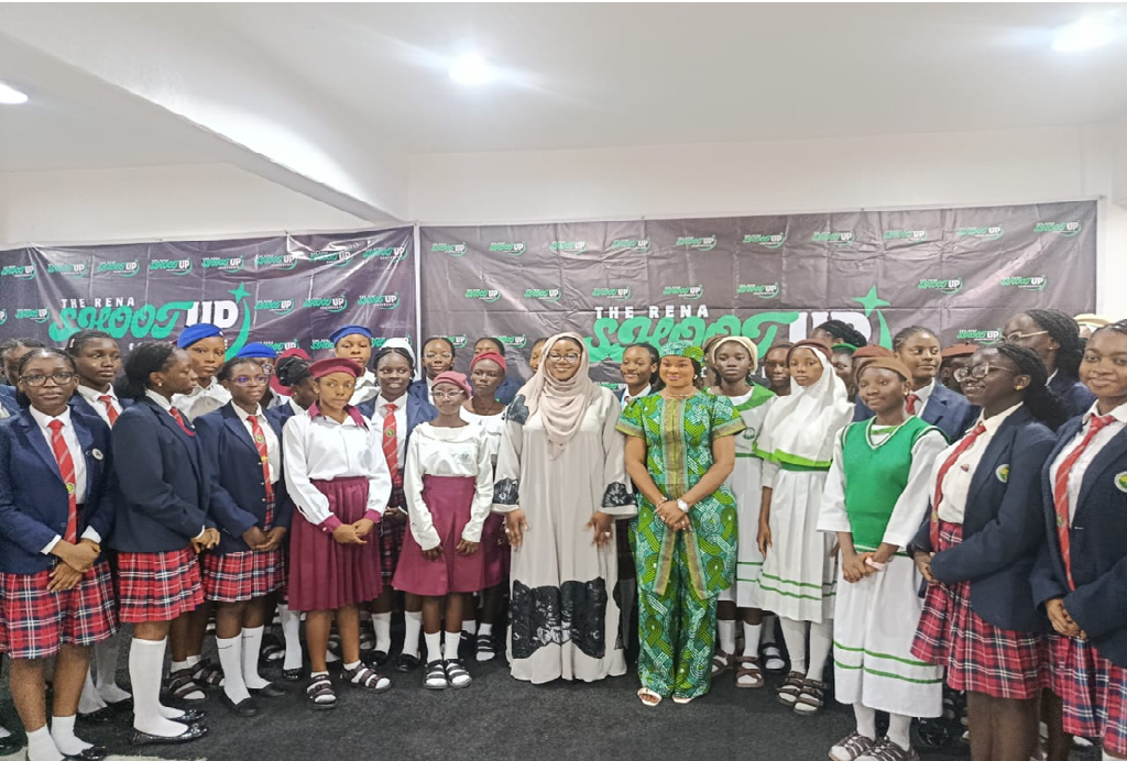 A student speaking on stage at the RENA Shoot Up Conference 2025 in Abuja, as experts stress inclusion and leadership for the girl child.