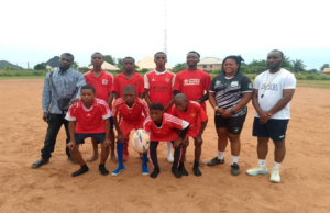 Greenbull RFC players celebrate after defeating Isukwuato RFC 12–0 to win the South East Rugby Tournament title.