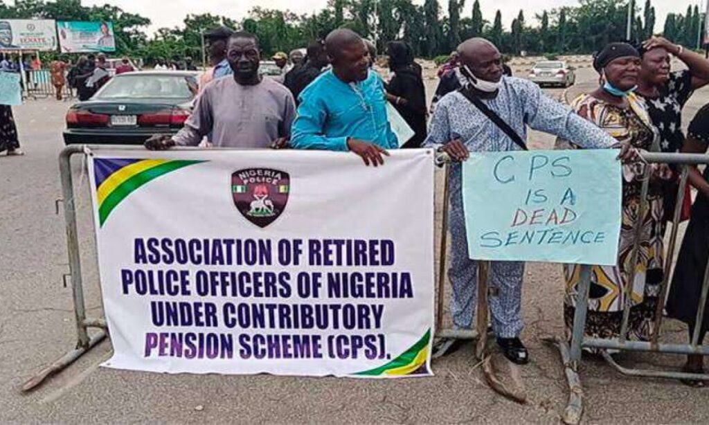Retired Nigerian police officers protesting in Abuja demanding exit from contributory pension scheme and signing of Police Exit Bill