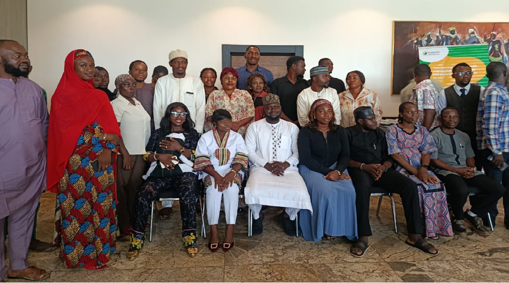 Participants at a policy roundtable in Abuja discussing digital social protection, informal workers, and inclusion challenges in Nigeria.