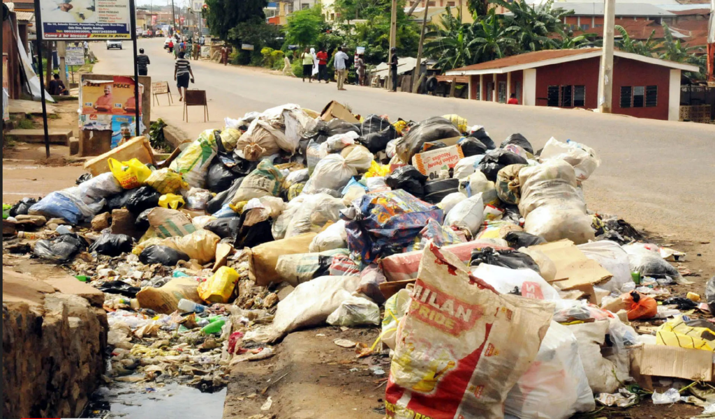 Environmental enforcement officers monitoring illegal refuse dumping and noise pollution activities in Ilorin, Kwara State.