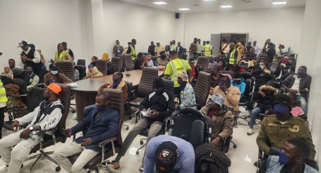 Nigerian returnees from South Africa arrive in Lagos and receive assistance from government agencies and support organisations.