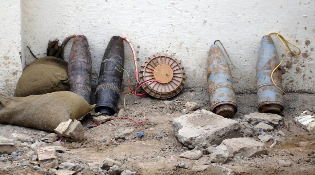 An armoured police vehicle and security personnel deployed on a rural road in Zamfara State after an improvised explosive device explosion claimed the lives of three officers during an anti-bandit operation