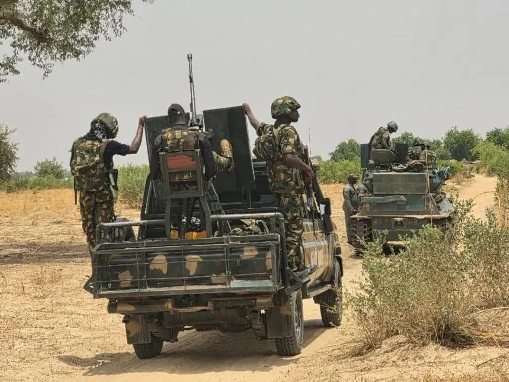 Major General Michael Onoja addresses journalists in Abuja while presenting details of military operations that rescued kidnapped victims, arrested terror suspects, and dismantled criminal networks nationwide