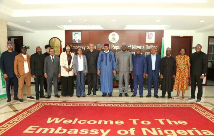 Defence Minister General Christopher Musa (retd.) and Nigerian officials meeting Chinese defence representatives in Beijing to discuss military technology transfer, local defence manufacturing and strategic security cooperation