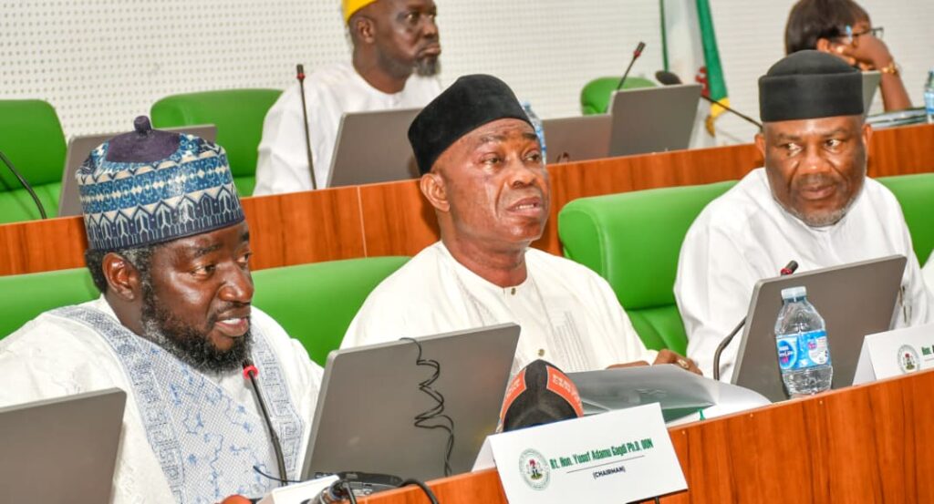 House committee members question police officials during a hearing on the alleged PFIPC fraud investigation in Abuja