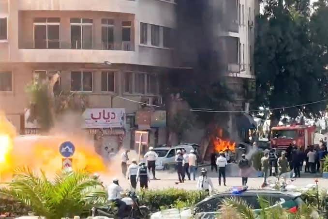 Security personnel responding after explosions in Damascus during French President Emmanuel Macron’s visit to Syria.