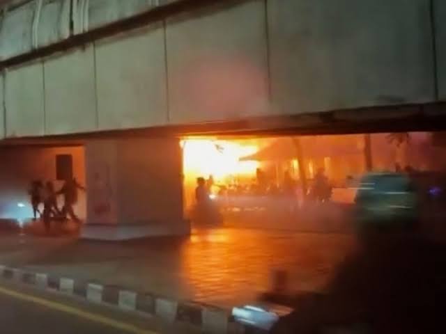 Emergency responders at the scene of a deadly fire at a live music pub in Bangkok, Thailand.
