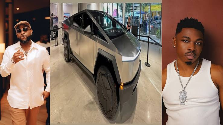 Afrobeats artiste Davido gifting Mayorkun a Tesla Cybertruck in a celebrity gesture involving Nigerian music stars.