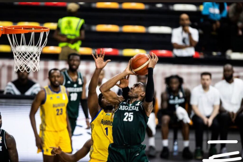 Nigeria's D'Tigers players celebrate after defeating Rwanda 106-62 to complete a perfect 3-0 run and qualify for the second round of the 2027 FIBA Basketball World Cup African Qualifiers
