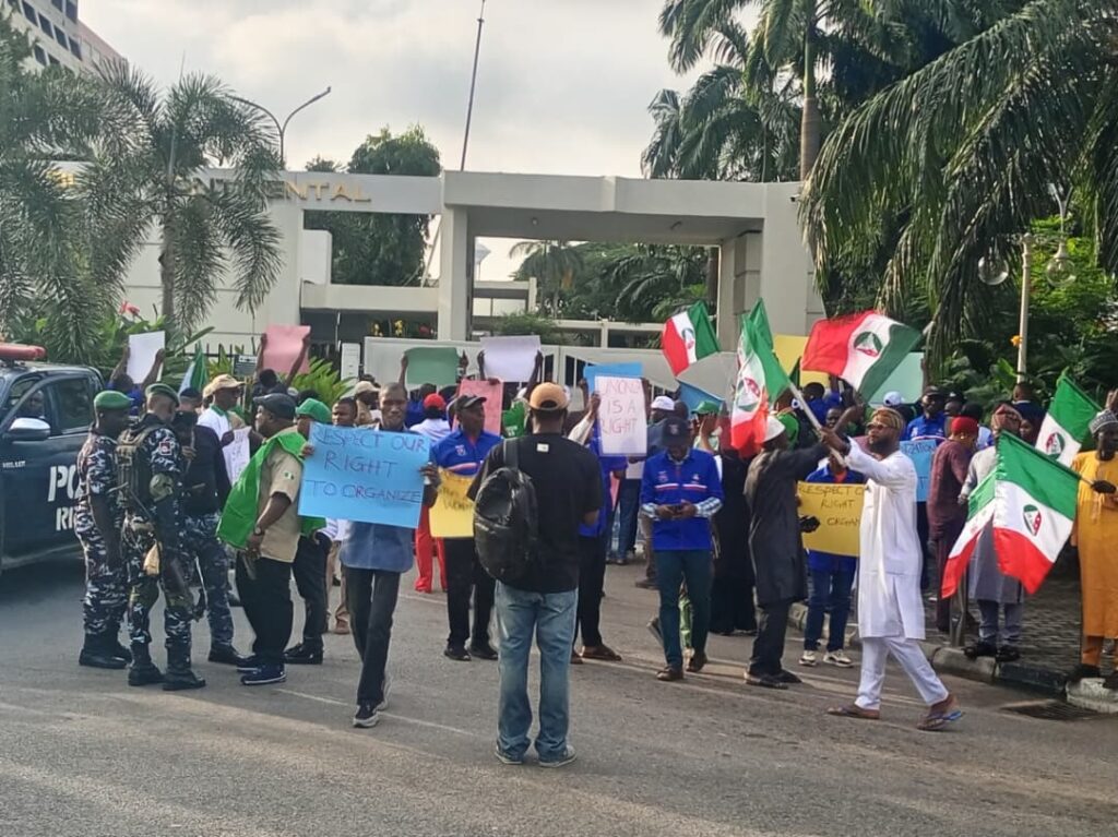 TUC officials and hotel workers picketing the Abuja Continental Hotel over alleged unfair labour practices in Abuja