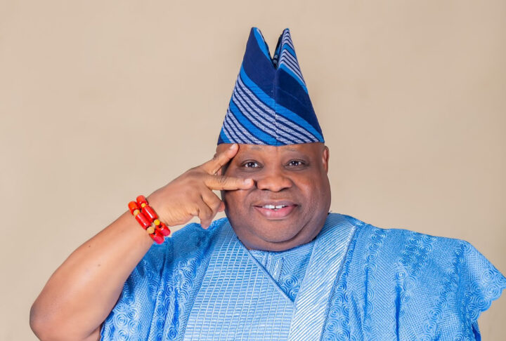 Osun Governor Ademola Adeleke receiving his Certificate of Return from INEC National Commissioner Kunle Ajayi