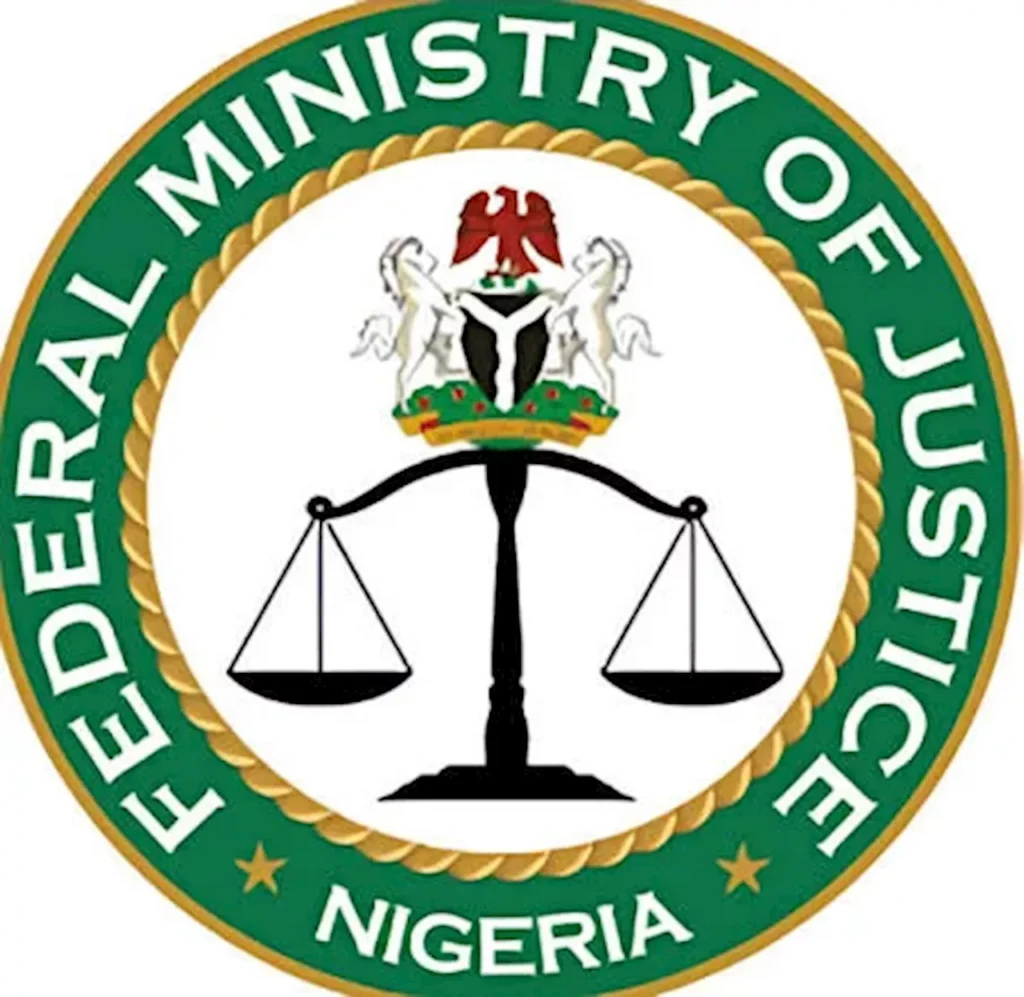Legal officers in court wearing official judicial robes