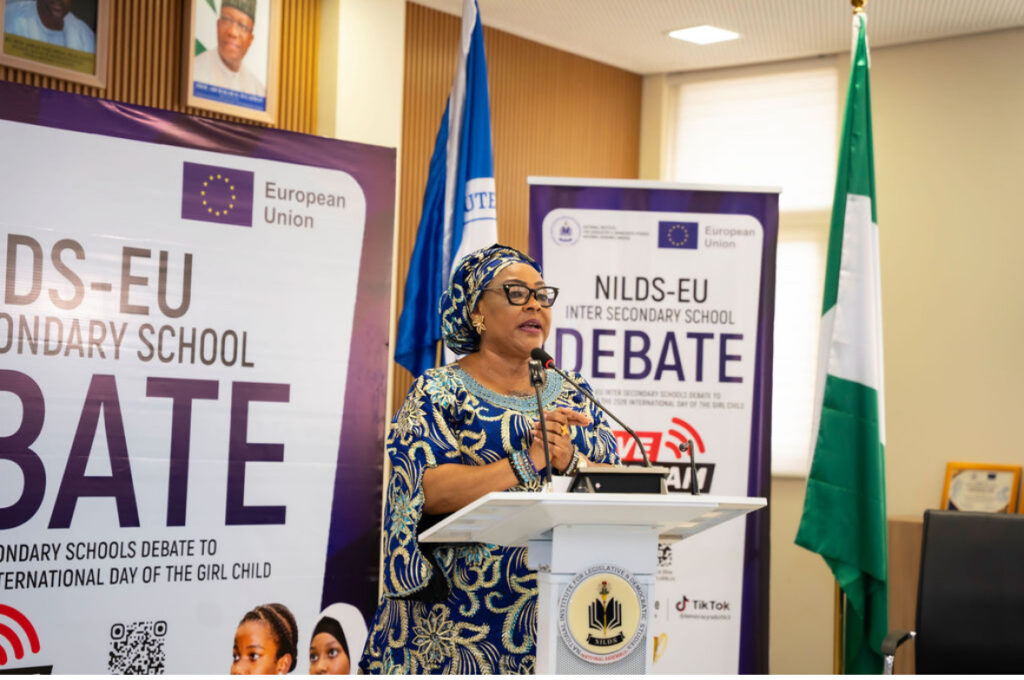 Chief Judge Evelyn Onyilo announces the results of the NILDS-EU inter-secondary school debate in Abuja.